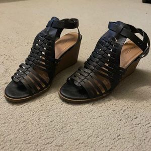 Black strappy wedge sandal